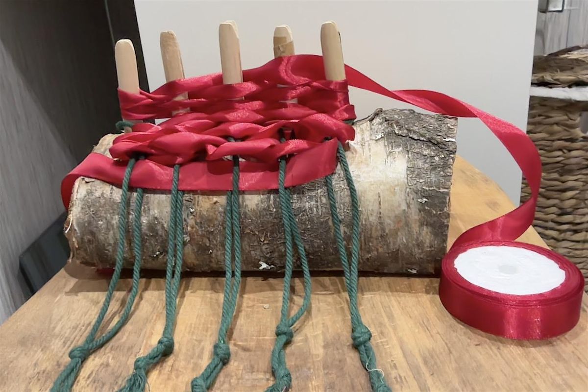 Festive weaving on a hand built peg loom.