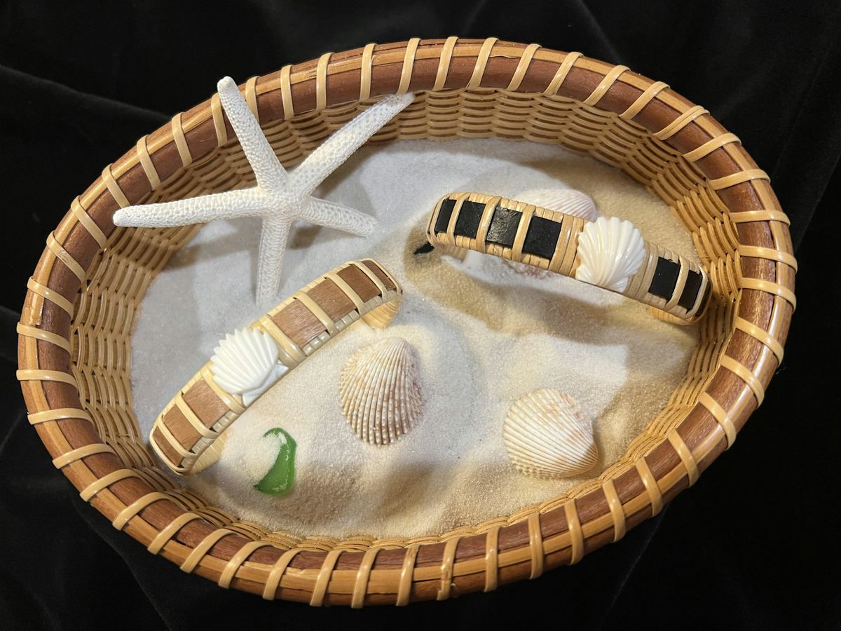 Bracelet woven in the Nantucket Style with natural wood and a carved shell