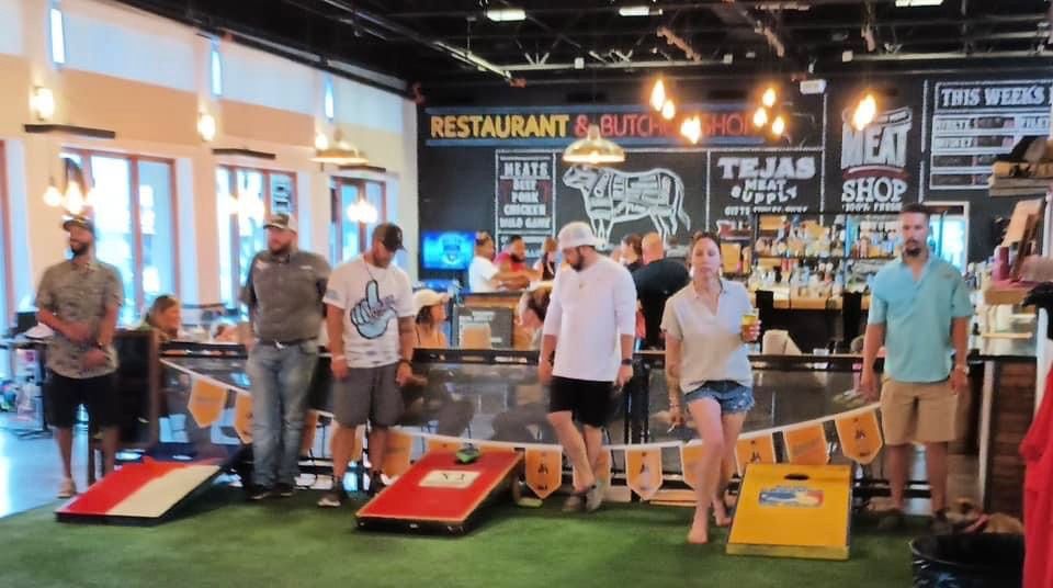 Tossing Bags and Drinking Beer ATX Cornhole Tournament Tejas Meat