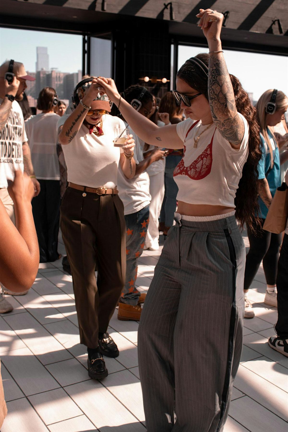 SILENT DISCO of the DECADES at the I\/O Rooftop of the Godfrey Hotel