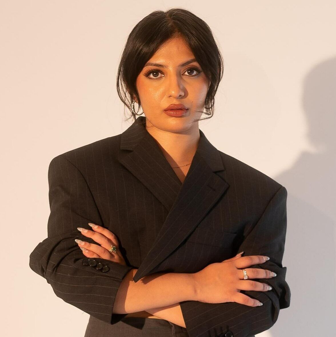 Gauri B
